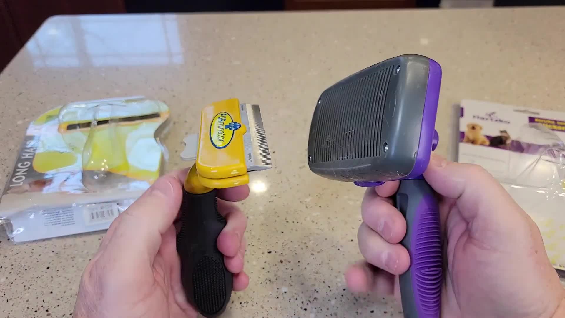 Detailed view of the Furminator's button and moving combs.
