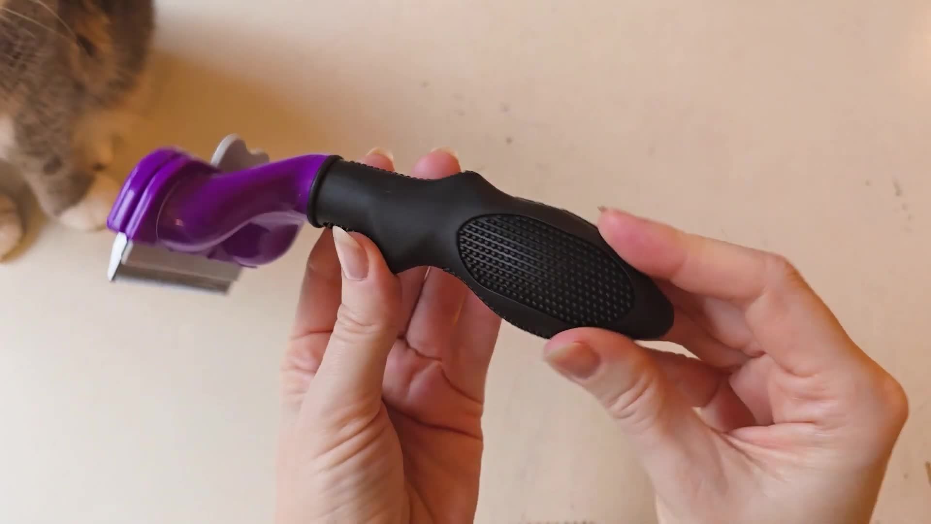 Close-up shot of the Furminator showing its texture.