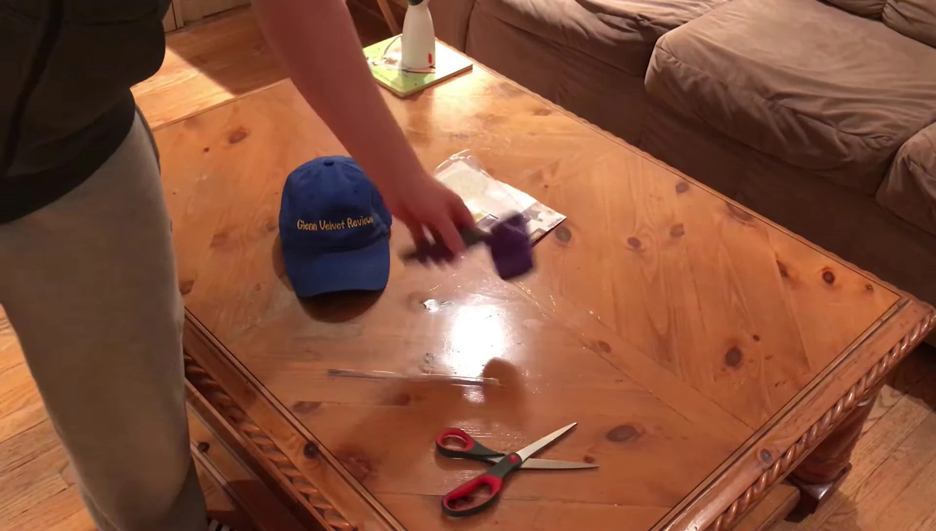 Close-up of the Hertzko Self-Cleaning Slicker Brush being taken out of its packaging.