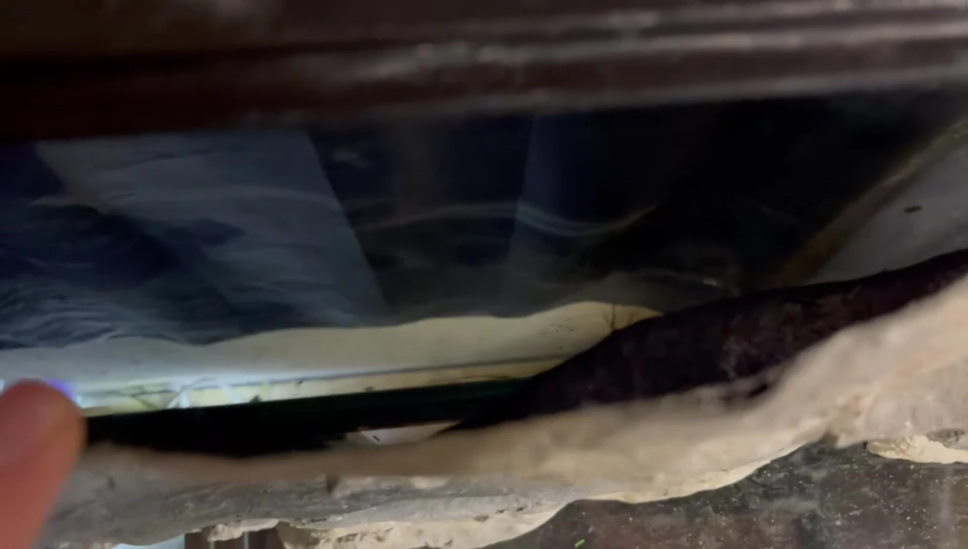 The presenter pointing at the planned location of the filter intake.