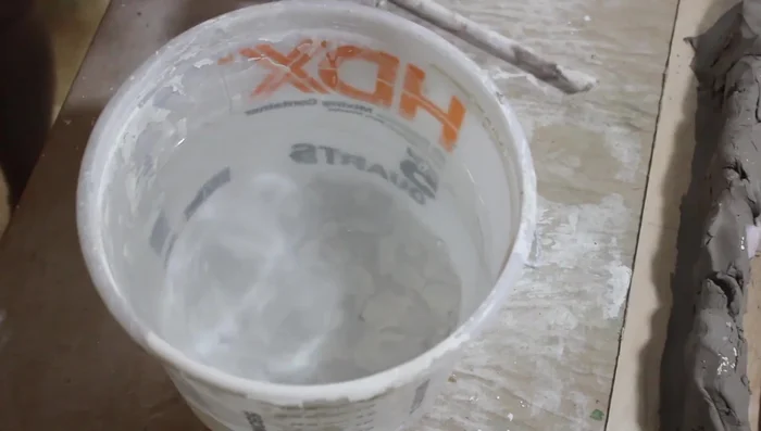 Mix plaster of Paris with warm water to a thick milkshake consistency. Pour it into the clay form (or the larger form if created) and let it set for at least 8 hours (16+ recommended).