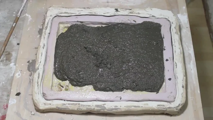 Pour the concrete into the alginate mold, ensuring an even surface and removing air pockets. Let it set for at least 8 hours (18+ recommended).