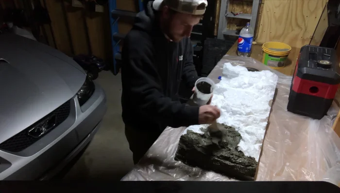 Allow the concrete mix to cure completely (24 hours). Once cured, the background will be extremely hard and durable, suitable for submersion in the aquarium.