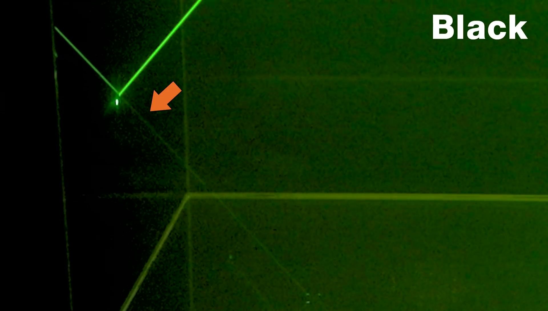 Laser beam comparison between a clear and a white background, showing diffuse reflection.