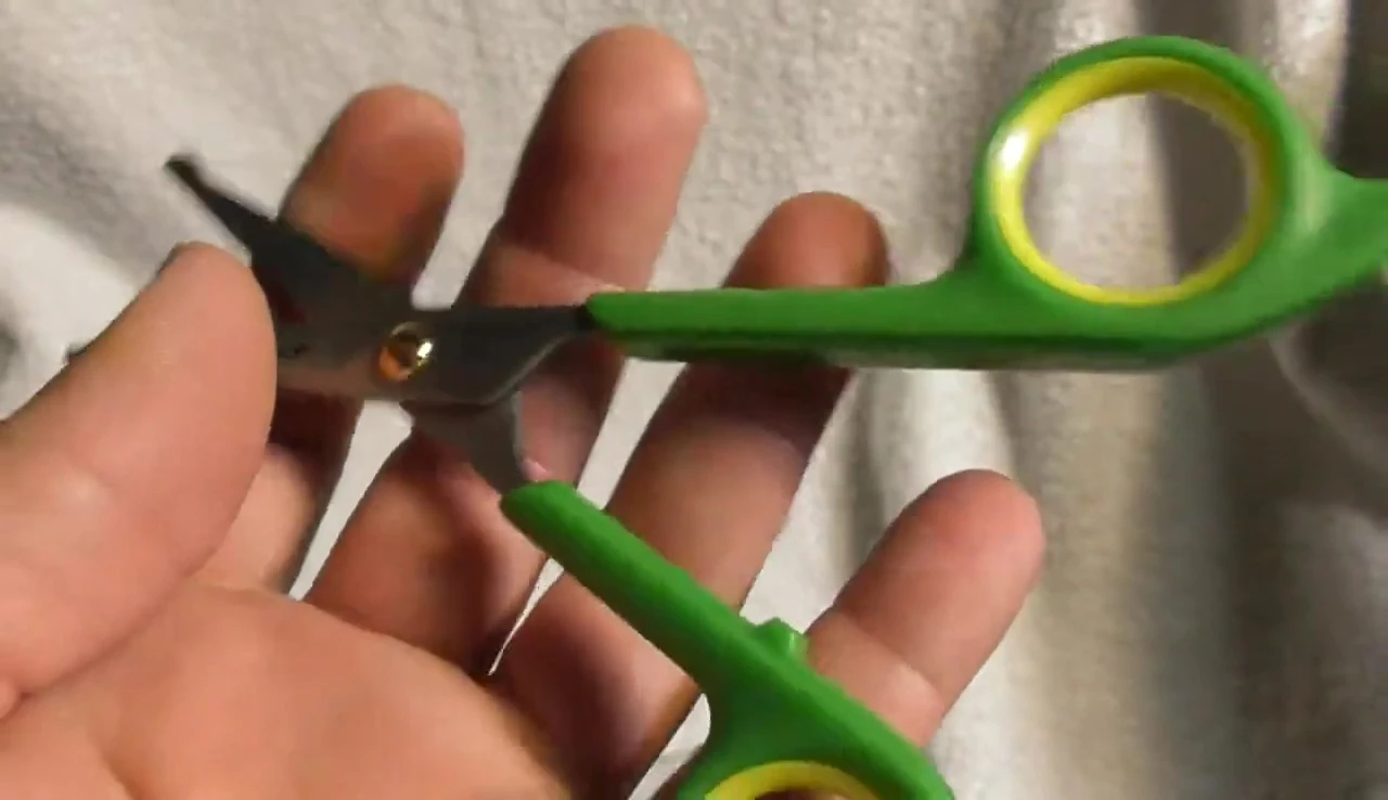 Close-up showcasing the feel and quality of the scissors.