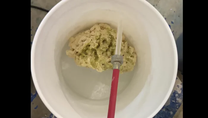 Add bleach to the water (the speaker uses a generous splash).