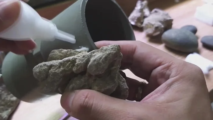 Apply superglue: Add a small amount of superglue to the cotton. Avoid excessive amounts to prevent fumes and potential fire.