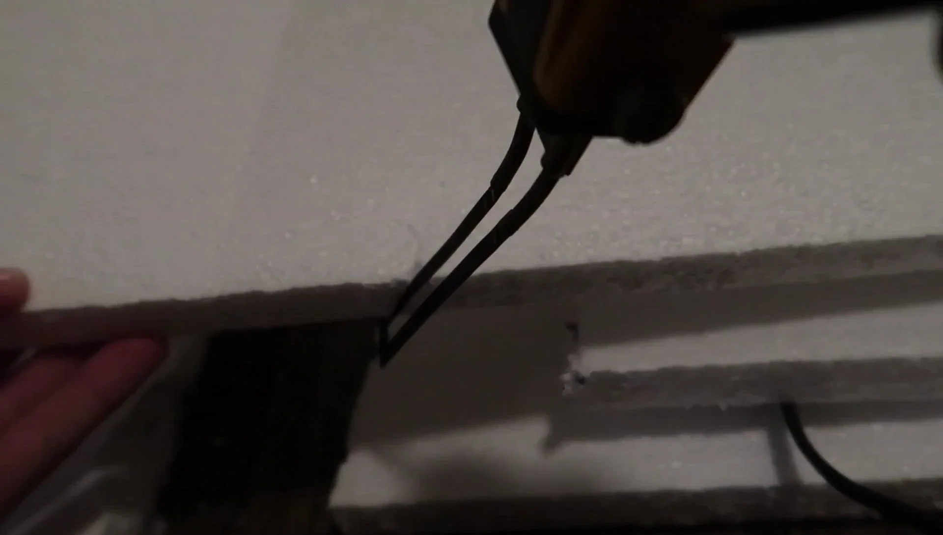 Using a hot knife to cut styrofoam