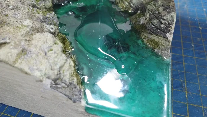 Adding white water using Vallejo foam and snow texture.