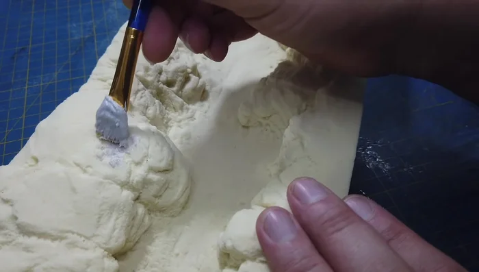 Priming the piece with a foam-safe primer.