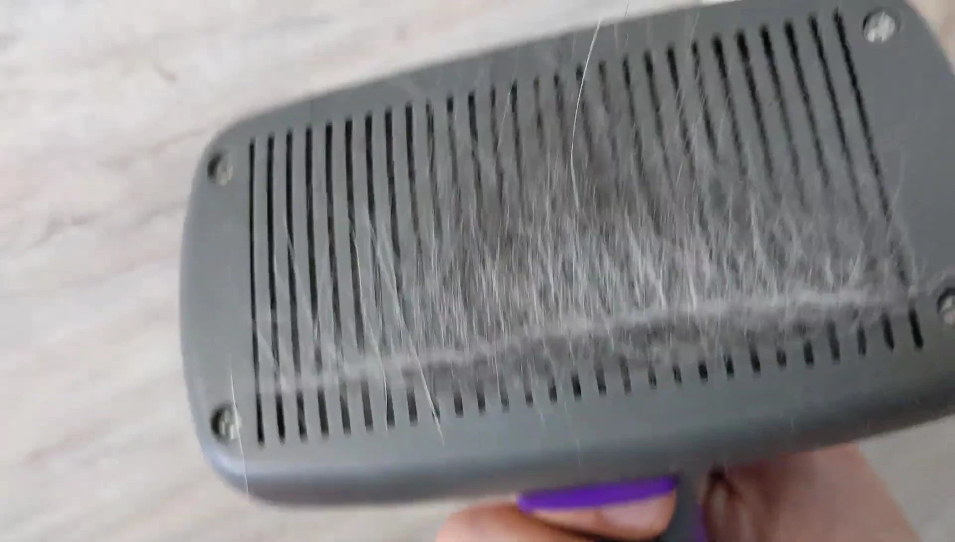 The self-cleaning mechanism of the brush in action.