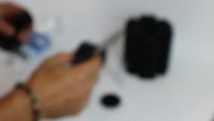 Modify the columns: Cut the spokes inside each column using scissors to allow better airflow for the air stone. Remove the centerpiece but save it for later.