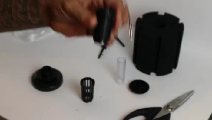 Install the air stone: Insert the air stone into the top of ONE column, ensuring it sits snugly at the bottom. Slide the second column over the tubing and connect it to the bottom column.