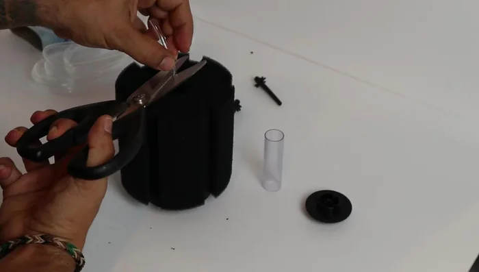 Cut and modify tubing length: Cut the tubing so it is flush with the top of the sponge, adding about 1/4 inch extra.