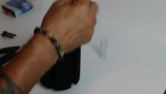 Connect uplift tube and tubing: Thread the excess tubing through the uplift tube, then connect the tubing to the top of the sponge filter. Slide the uplift tube down and connect it to the sponge filter.