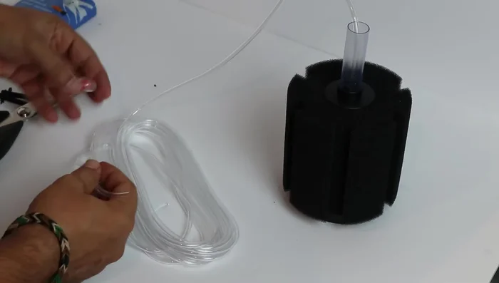 Install the check valve: Install the check valve to prevent backflow if power is lost. (Best placement is where the tubing exits the tank).