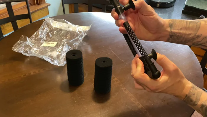 Position the suction cups on the aquarium glass, ensuring the filter is upright.