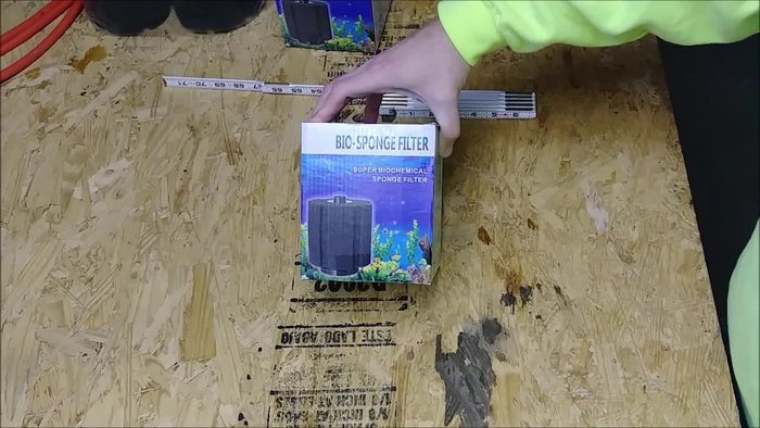 Overview of filter components: weighted base, filter sponge, diffuser, air intake tube.