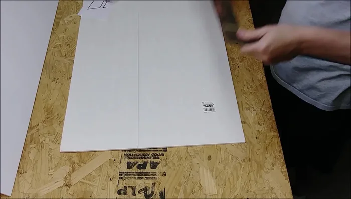 Cut the foam board template using a razor blade and carpenter's square for straight cuts.