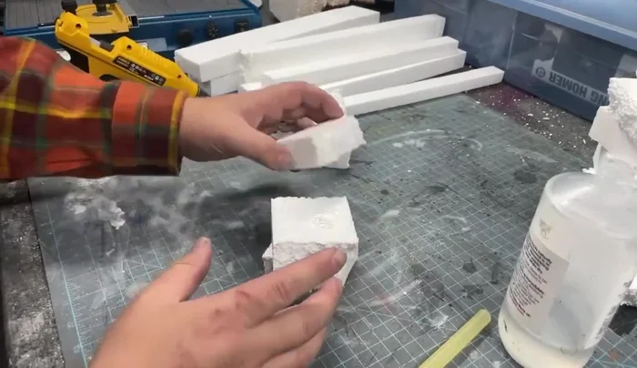 Use a heat gun to slightly melt and blend the foam pieces together, creating a more realistic texture.
