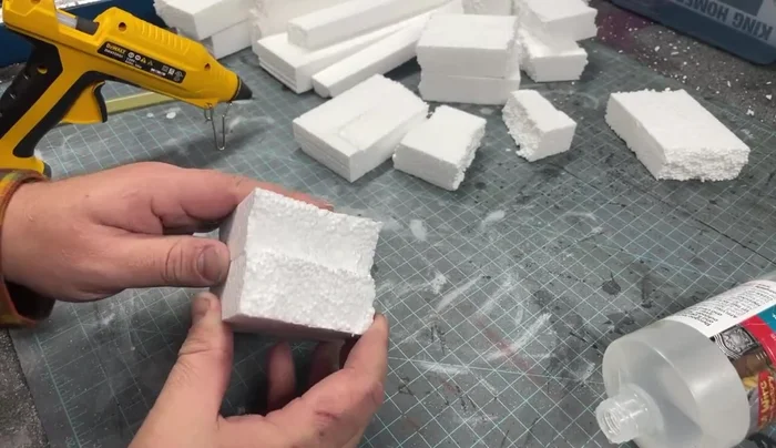 Use a heat gun to slightly melt and blend the foam pieces together, creating a more realistic texture.