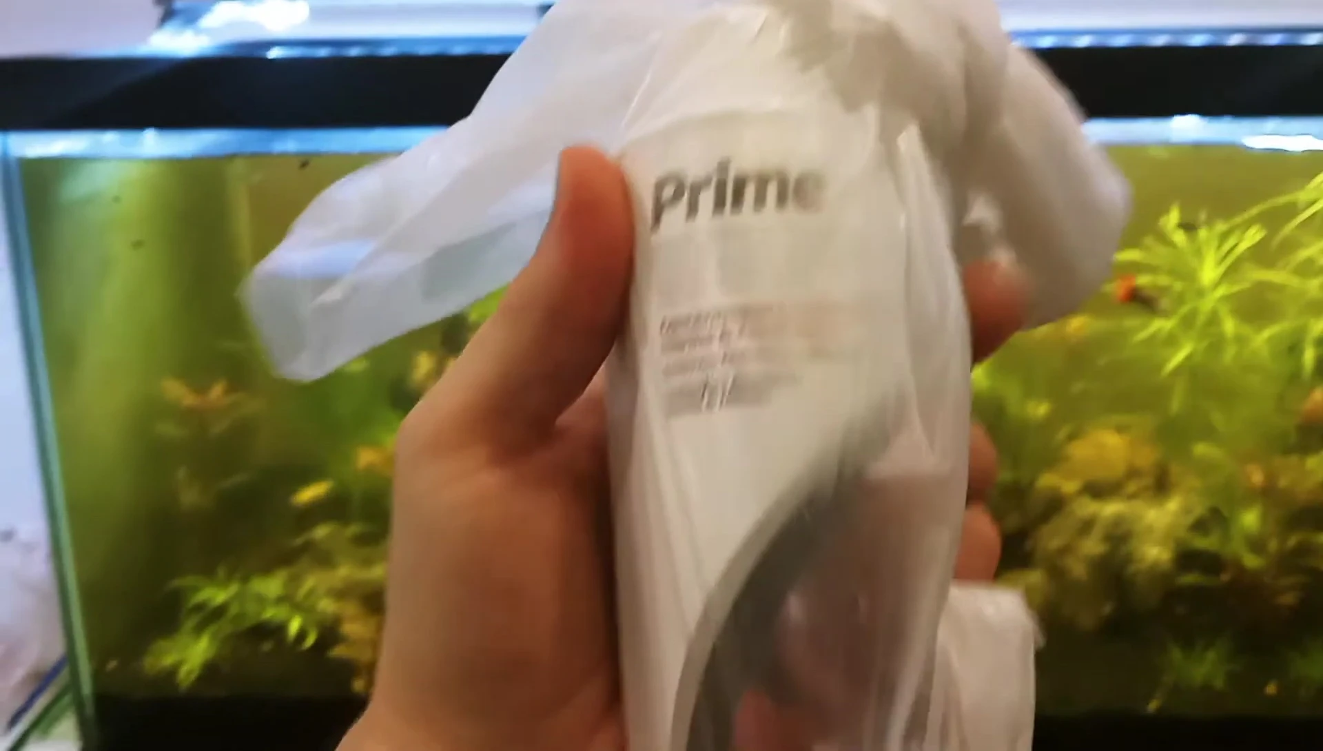 Bottle of Seachem Prime water conditioner.