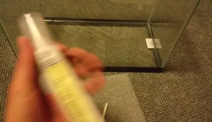 Apply silicone sealant to one side of the slits in the straws.