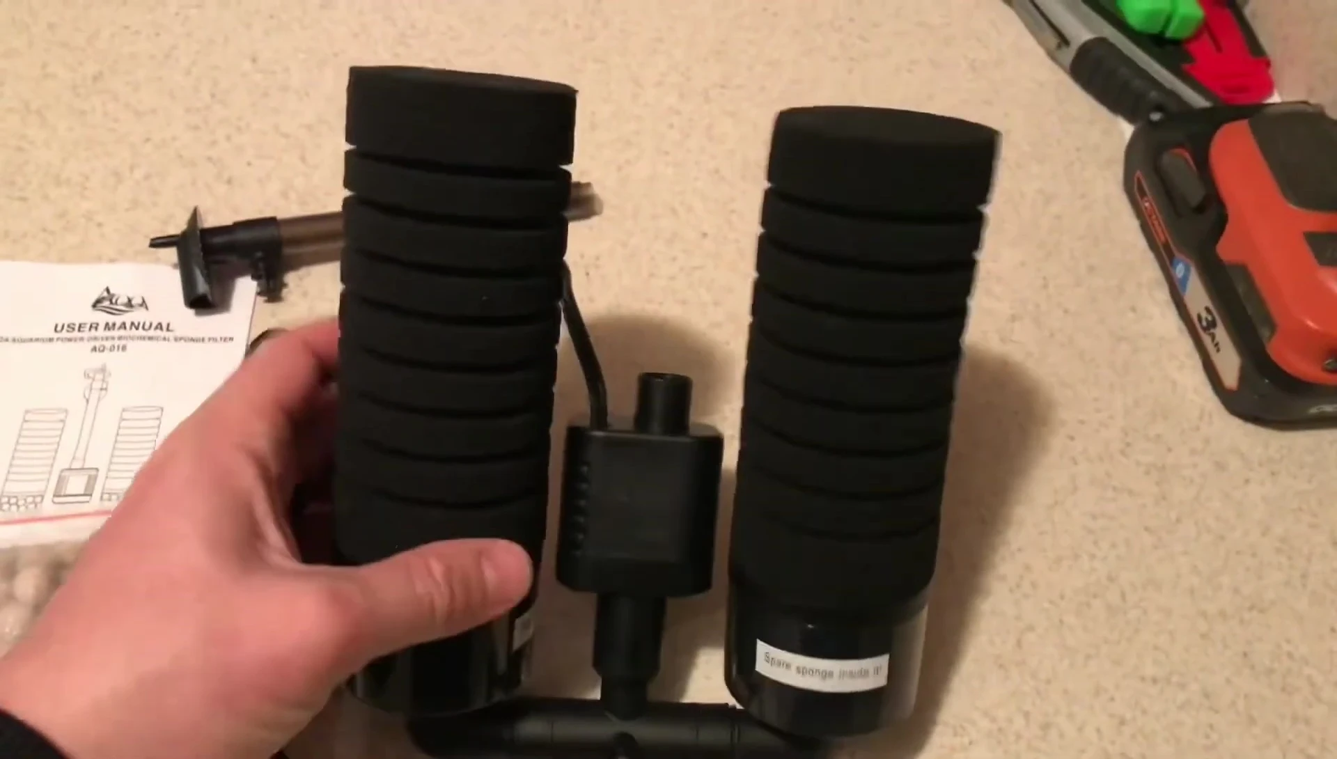The removable sponge filter, showing the space for the biological media.