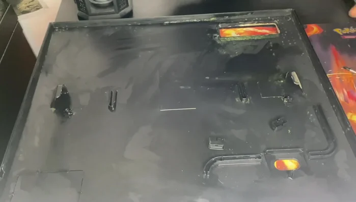 Secure the light cover with the screws.