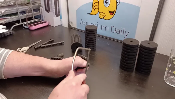 Modify top filter piece. Cut off the top of one filter piece to create a snug fit around the extended uprights. (Clean off any loose plastic bits.)