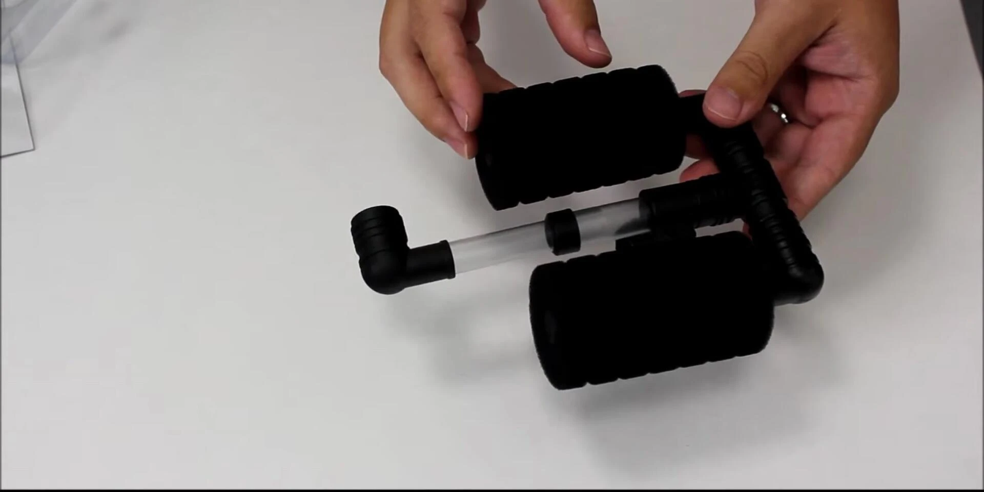The presenter explaining how to use the filter for a new tank.