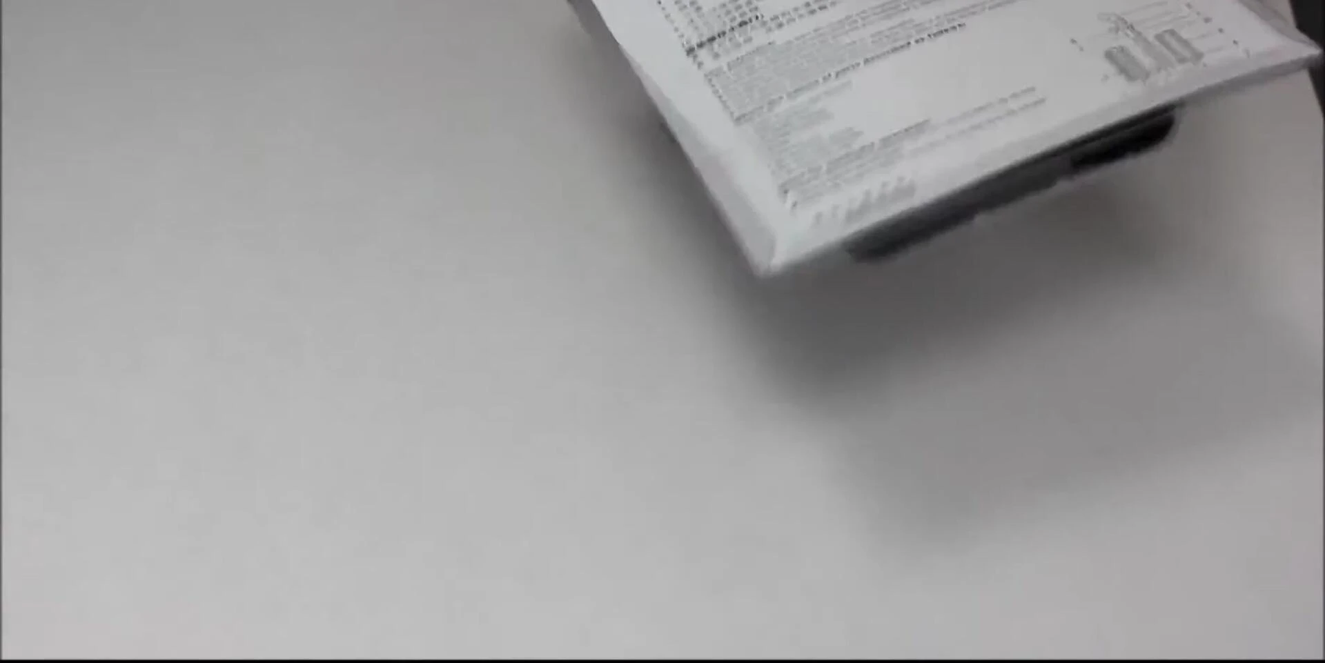Close-up of the filter components being taken out of the packaging.