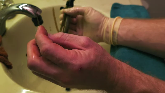 Clean the tubing and air valve: Use a small tool (like a nail) to clear any clogs in the small air passages within the tubing and the valve.