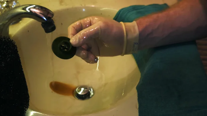 Reassemble the filter components and reattach it to the aquarium. Ensure the air valve is free of clogs.