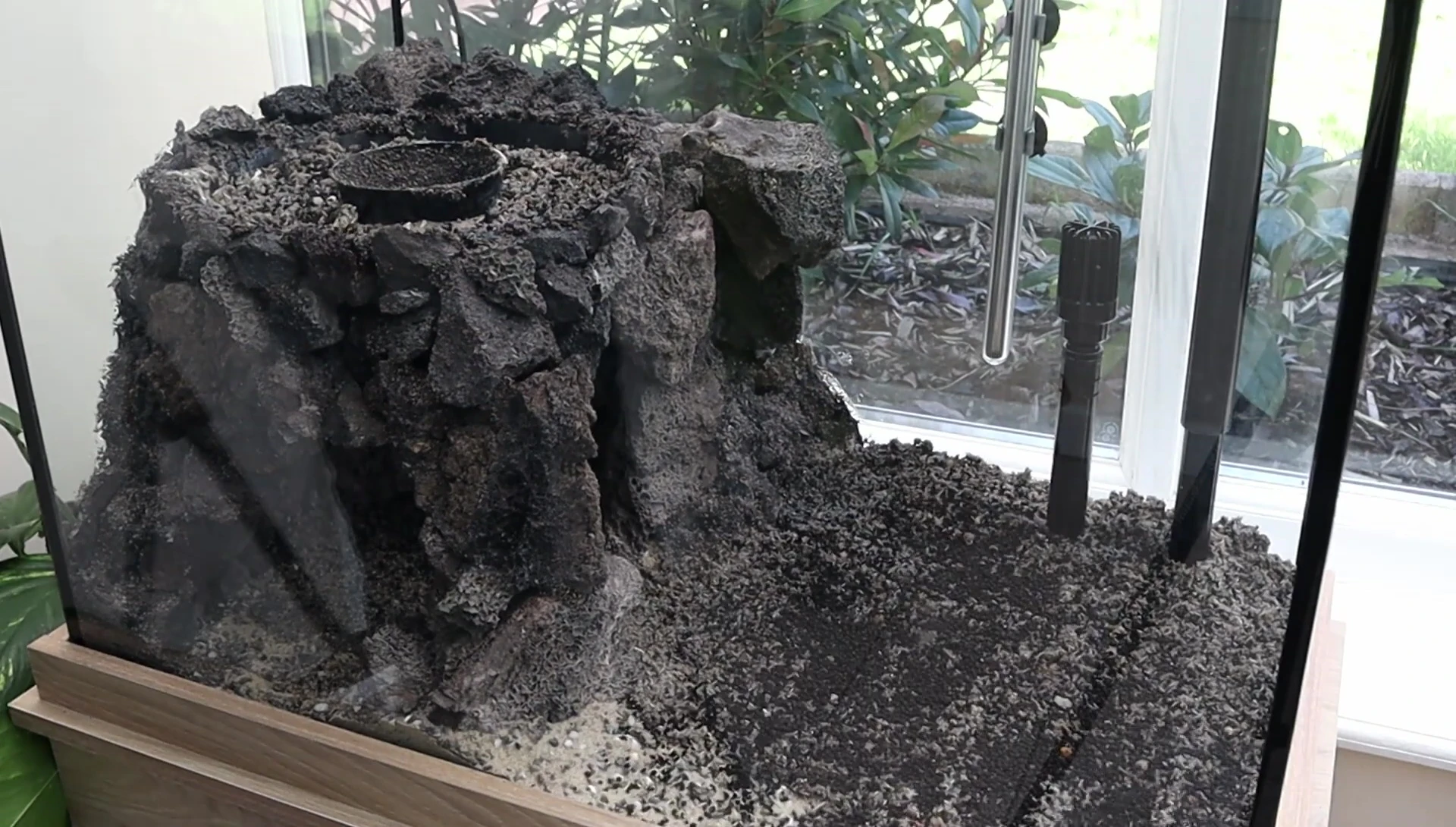 Layers of substrate, including aqua soil and nutrient tablets.