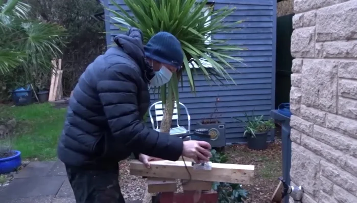 Round over the edges: Use a router with a round-over bit to smooth the edges of the square post. This makes carpet application easier.