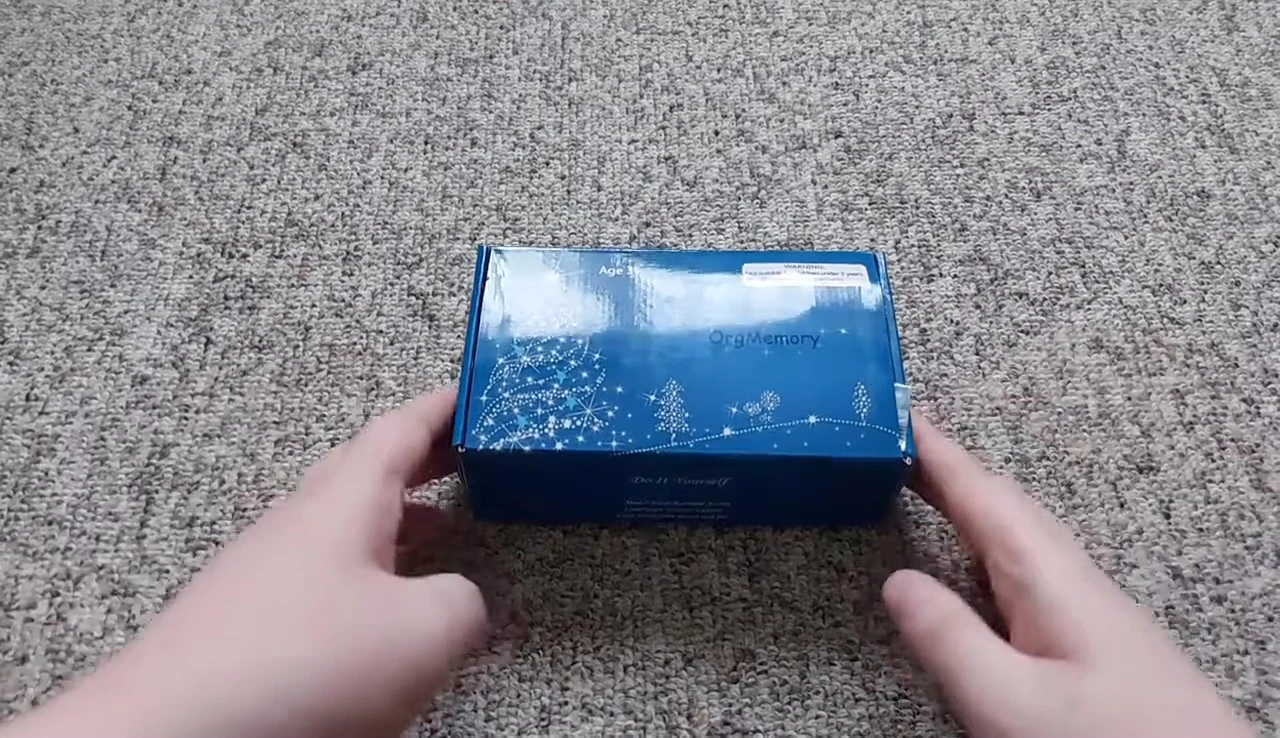 Opening the Christmas box.