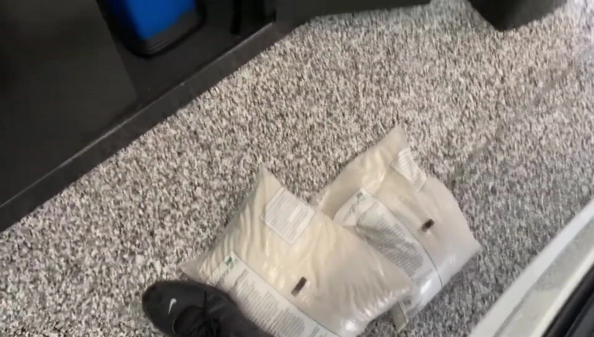 The speaker adding sand to the tank.