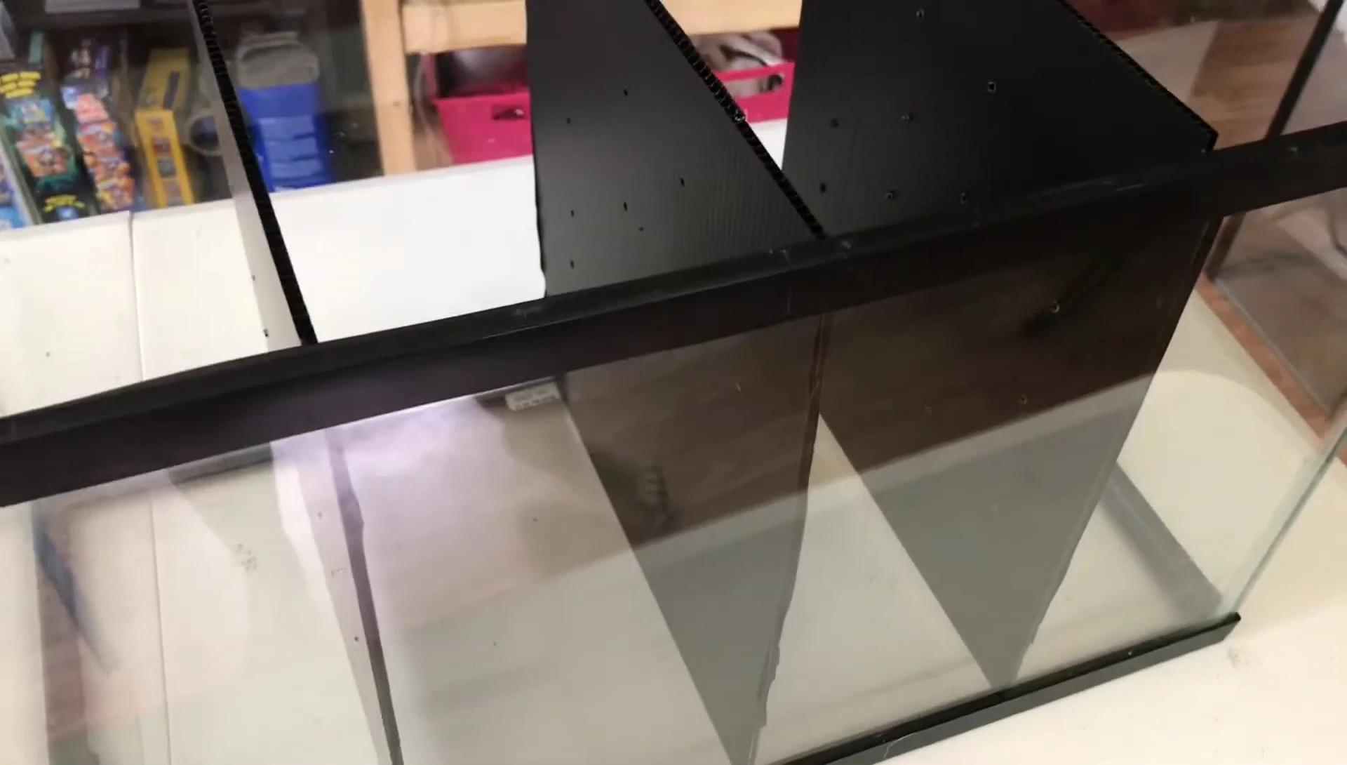 Adding sand to the bottom of the dividers.