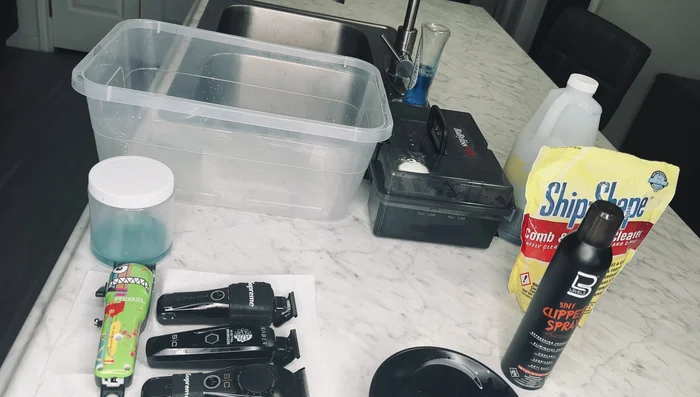 Disinfect combs/brushes: Clean visible debris from combs and brushes. Submerge in Barbicide solution for 10-15 minutes.