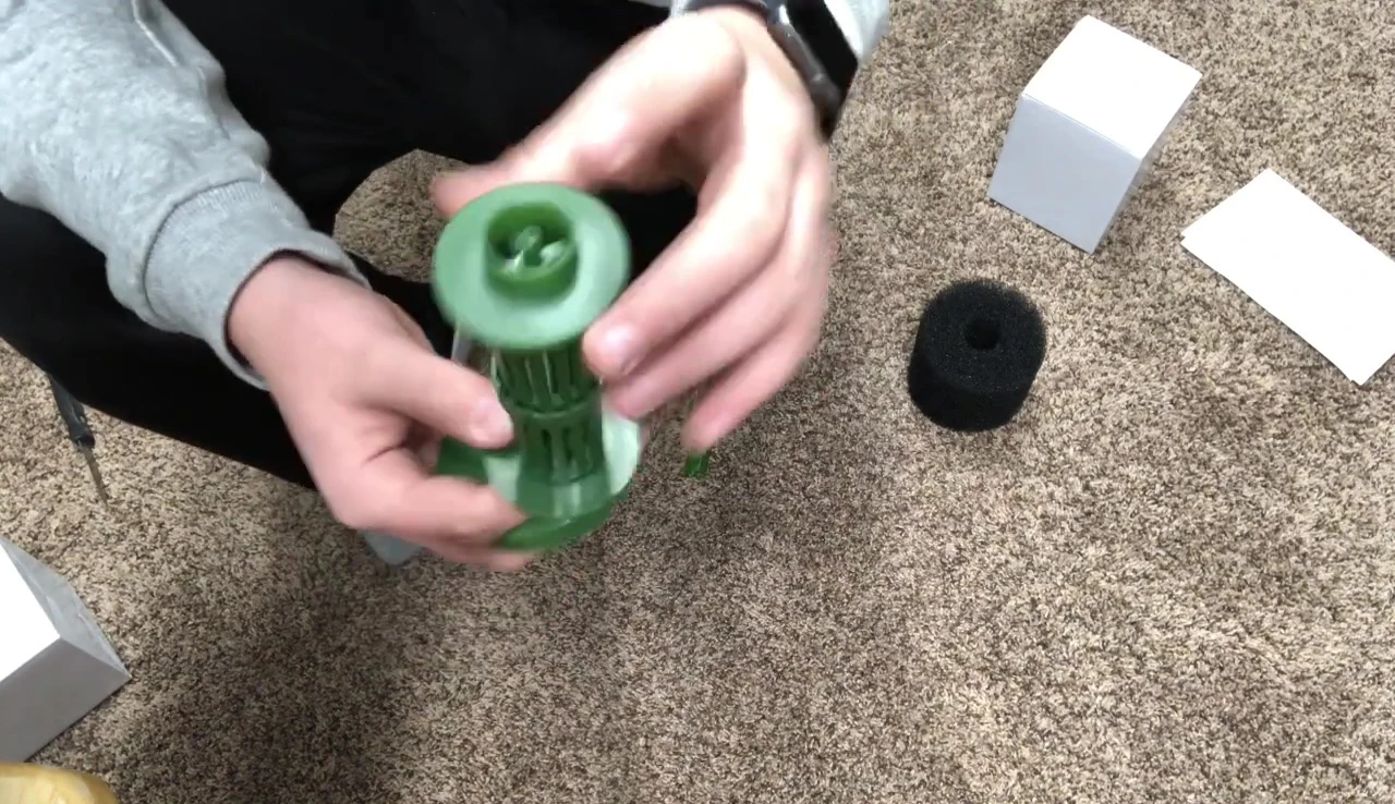 Connecting the airline tubing to the filter.