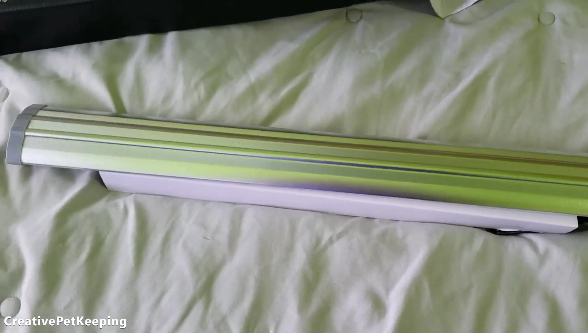 The Finnex Ray2 Slim LED light in its packaging