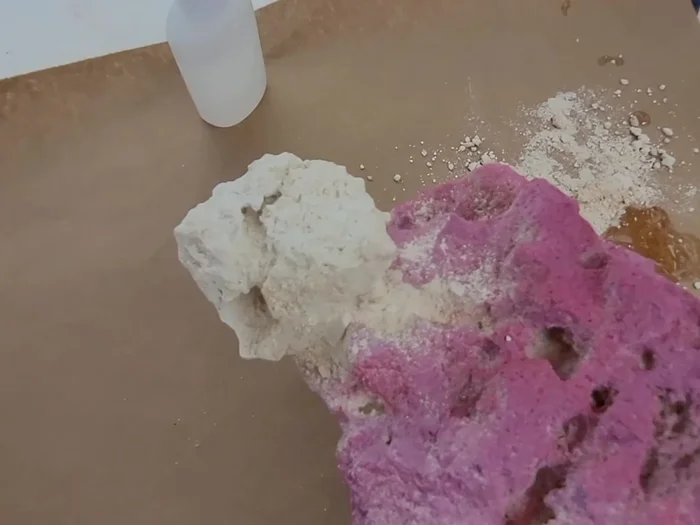 Glue the rocks together.