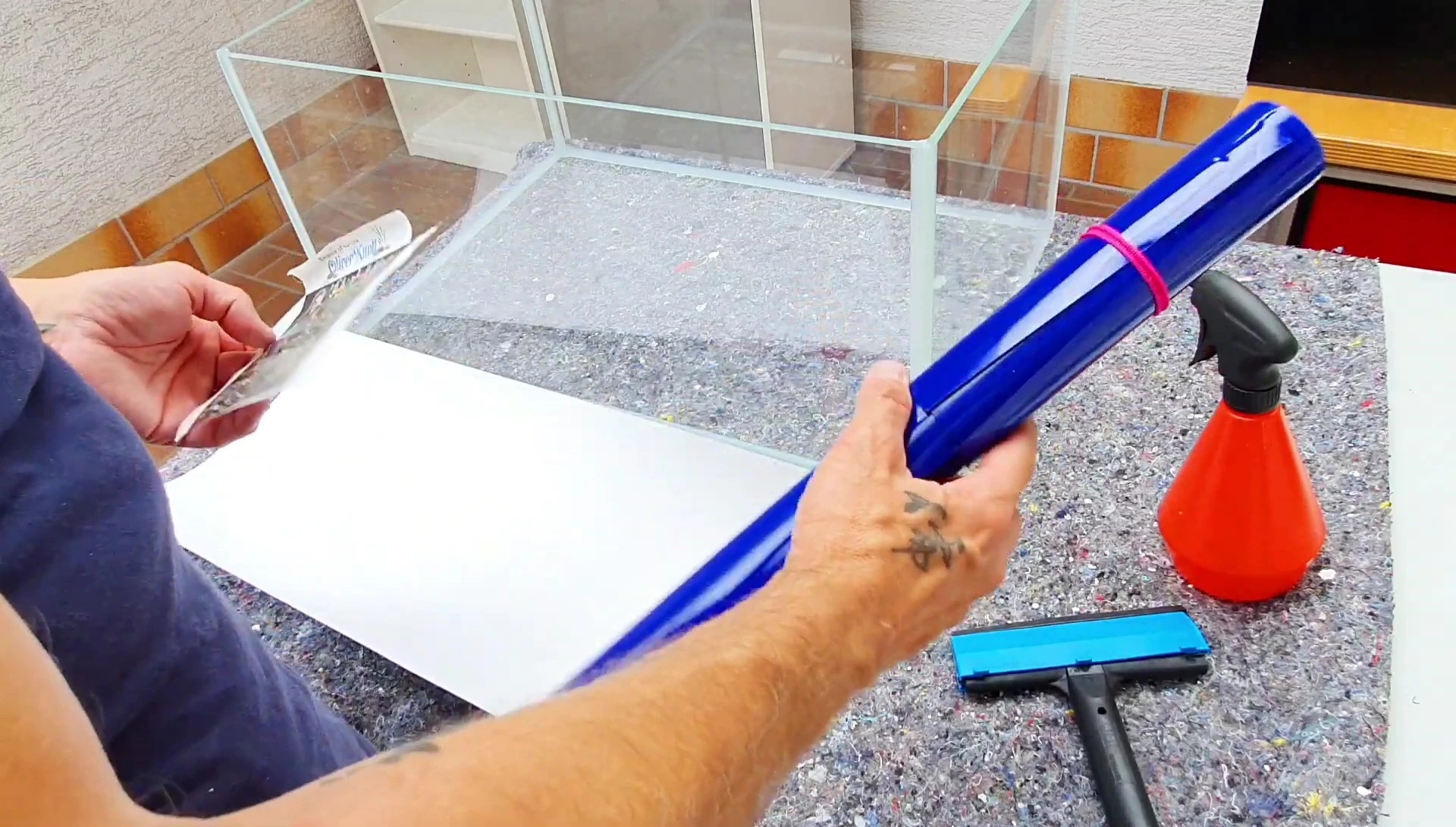 Cutting a piece of the foil for demonstration