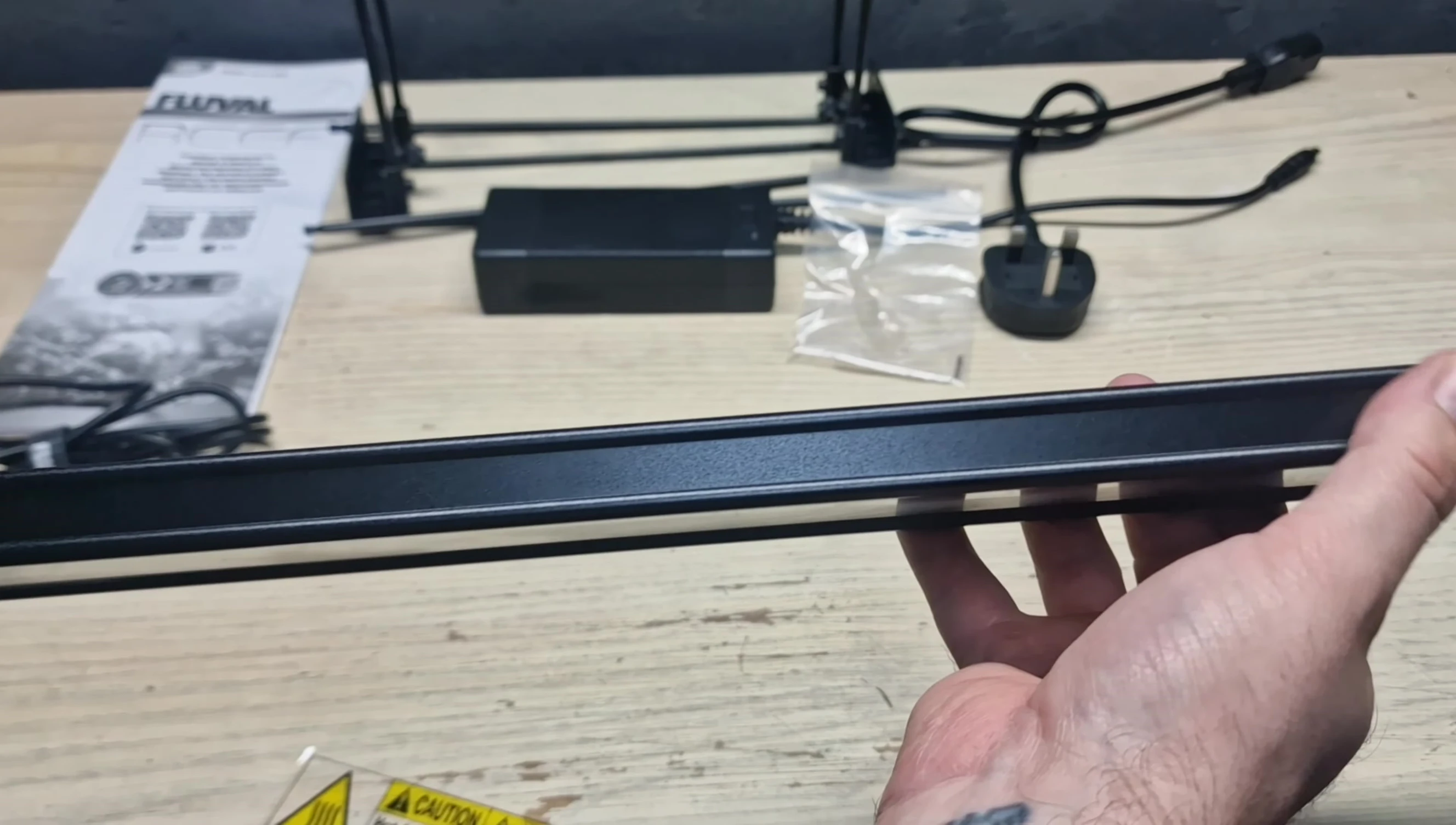 Image highlighting the thicker, aluminum shell of the Reef 4.0
