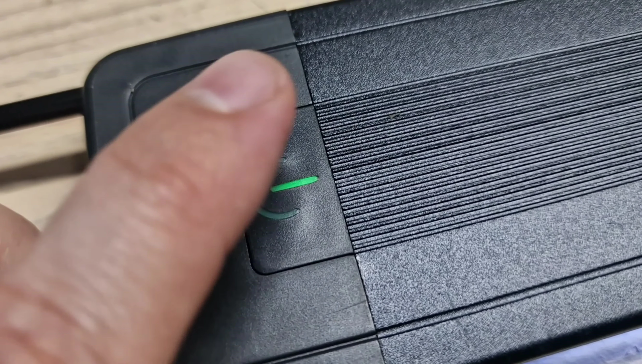 Close-up of the control button on the Fluval Reef 4.0