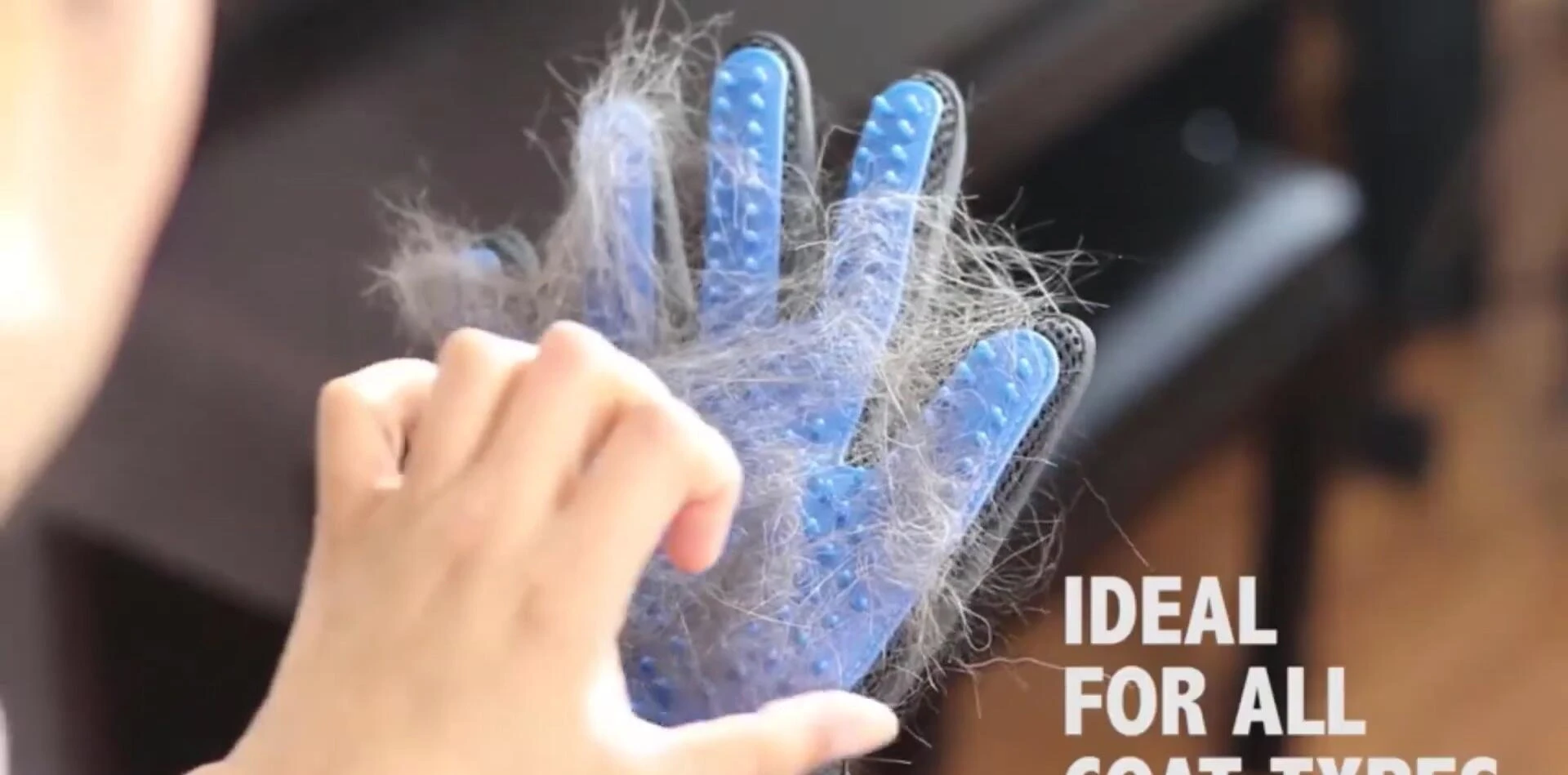 Demonstrating the glove's use