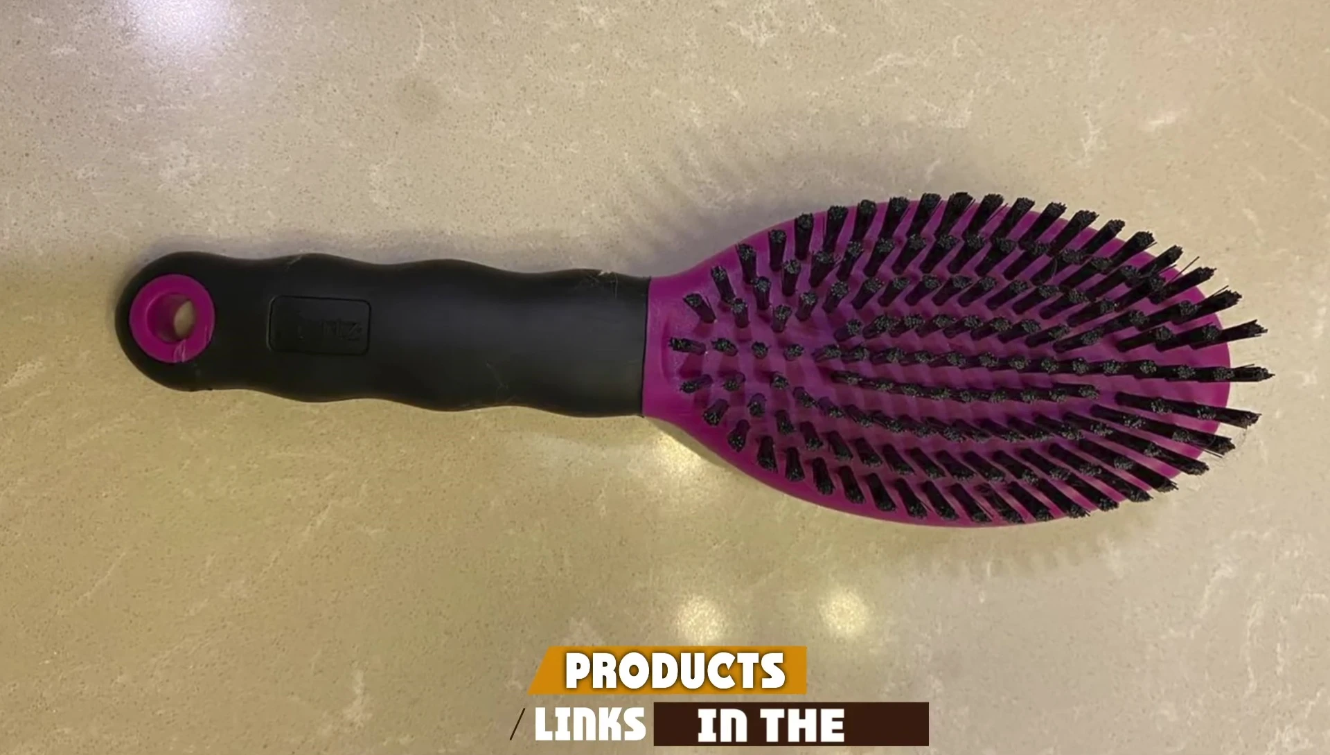Close-up showing both sides of the brush