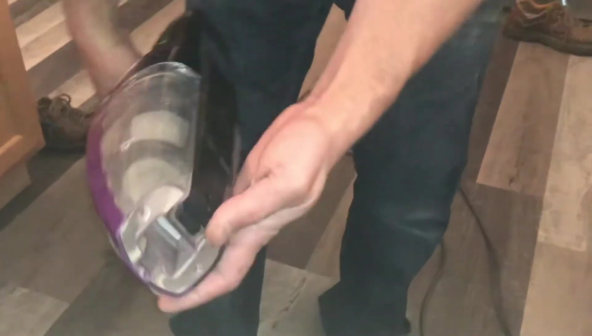 The reviewer holding the vacuum