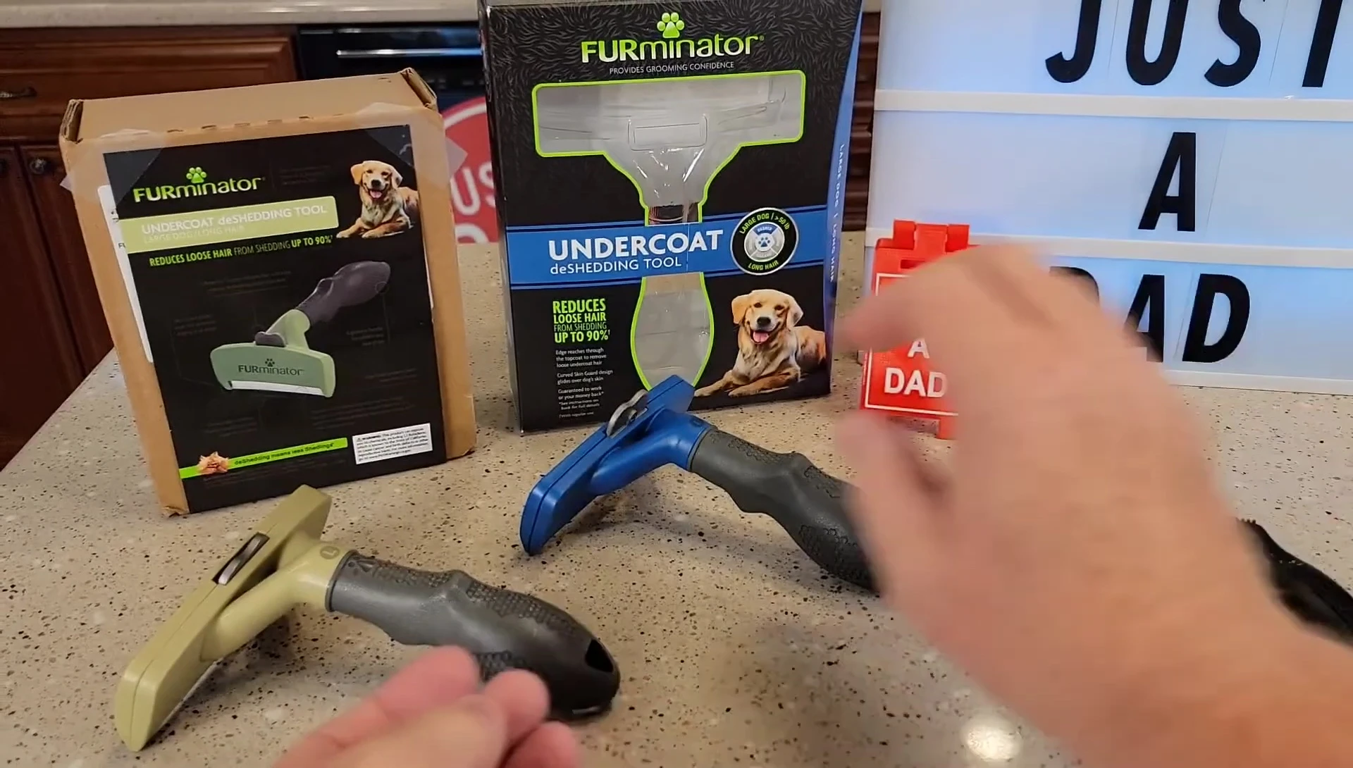Demonstration of the locking mechanism on the black FURminator tool